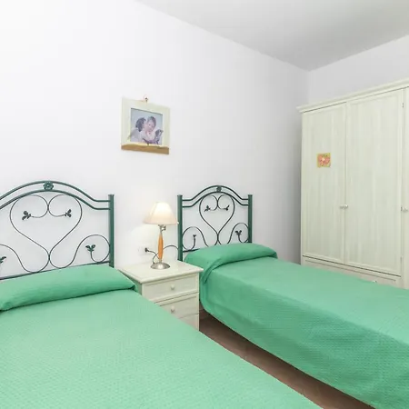 Casa San Teodoro Hébergement de vacances Lu Lioni